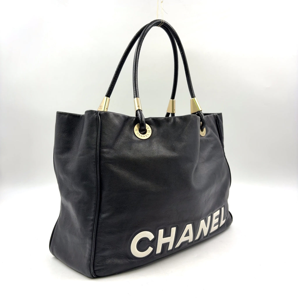 Pre-Owned camellia logo Serial number starting with 7 tote bag black lambskin Gold CHANEL