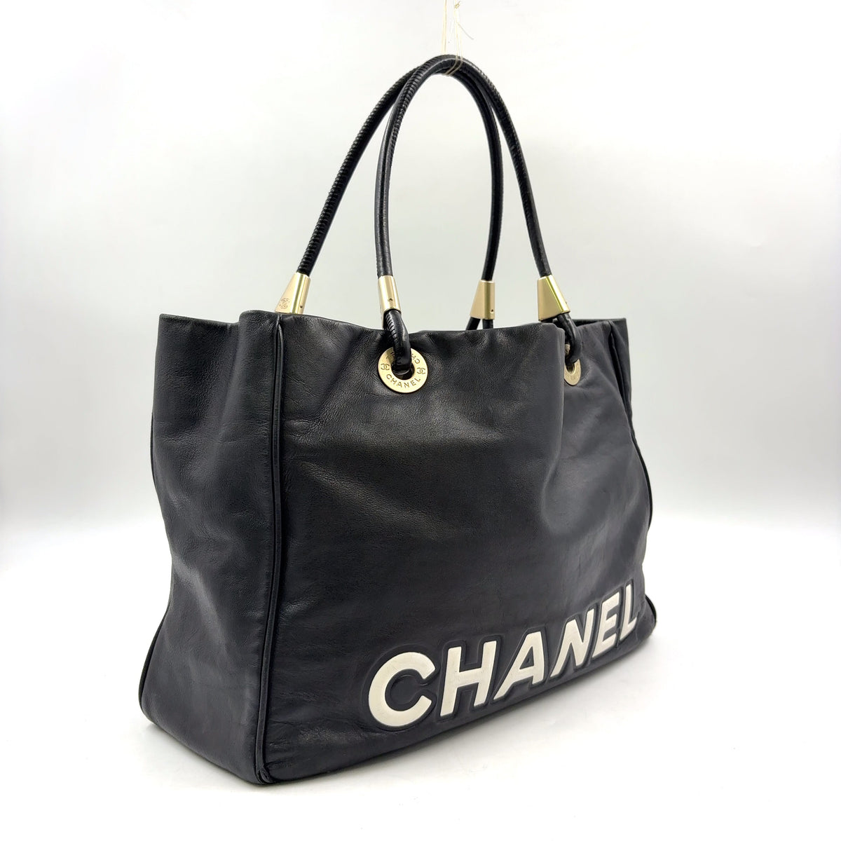 Pre-Owned camellia logo Serial number starting with 7 tote bag black lambskin Gold CHANEL