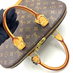 Pre-Owned Alma PM monogram Handbag Brown light brown Leather PVC Gold M51130 LOUIS VUITTON
