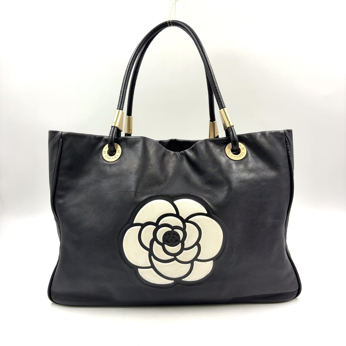 Pre-Owned camellia logo Serial number starting with 7 tote bag black lambskin Gold CHANEL